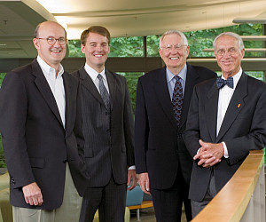 Henry J. Casey Professor of Law Ed Brunet, Jerry Carleton '07, Paul H. Casey, and John Bates
