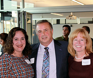 Lela Franco, Harley Franco '77, and Dean Jennifer Johnson visit during the Seattle Centennial Celebration event, held on September 30, 20...