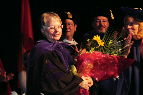 Associate Dean Martha Spence '84 receives recognition for her many years of service.