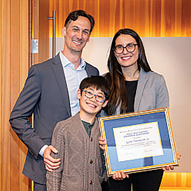 Katie Jahangiri '26, her husband Michael Patrick, and their son, Yuan Fa Patrick.