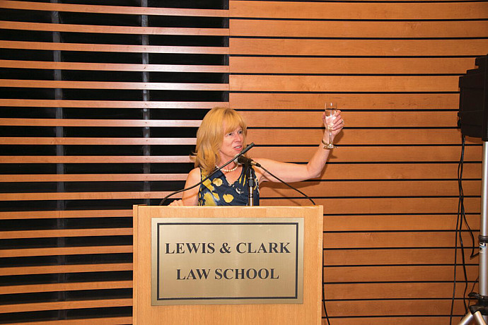 Dean Johnson offers a celebratory toast to the crowd gathered on campus Saturday evening.