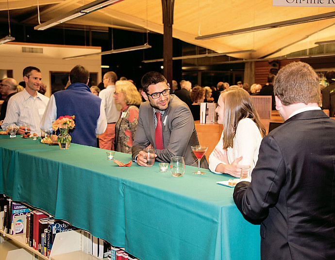Attendees socialize in Boley Law Library.