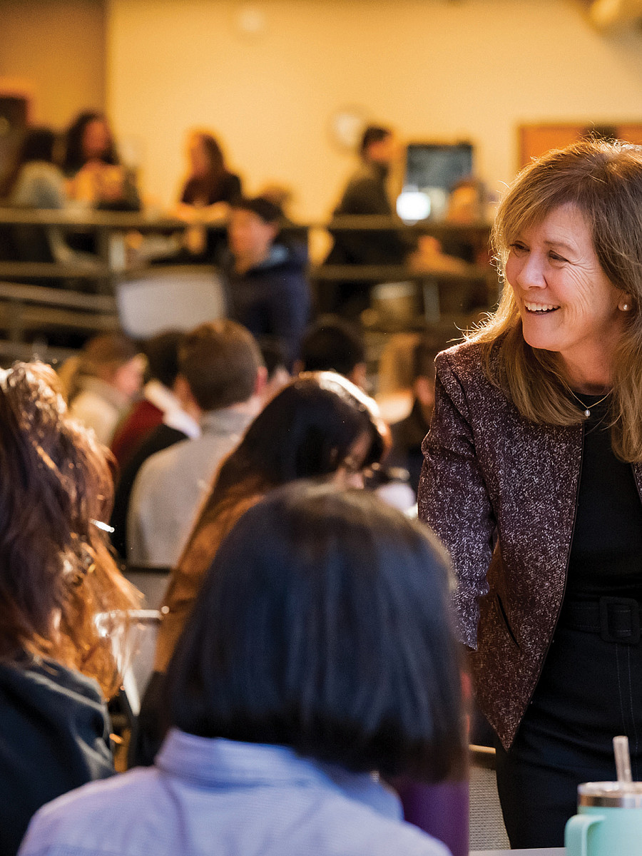 Dean Alicia Ouellette chats with law students.