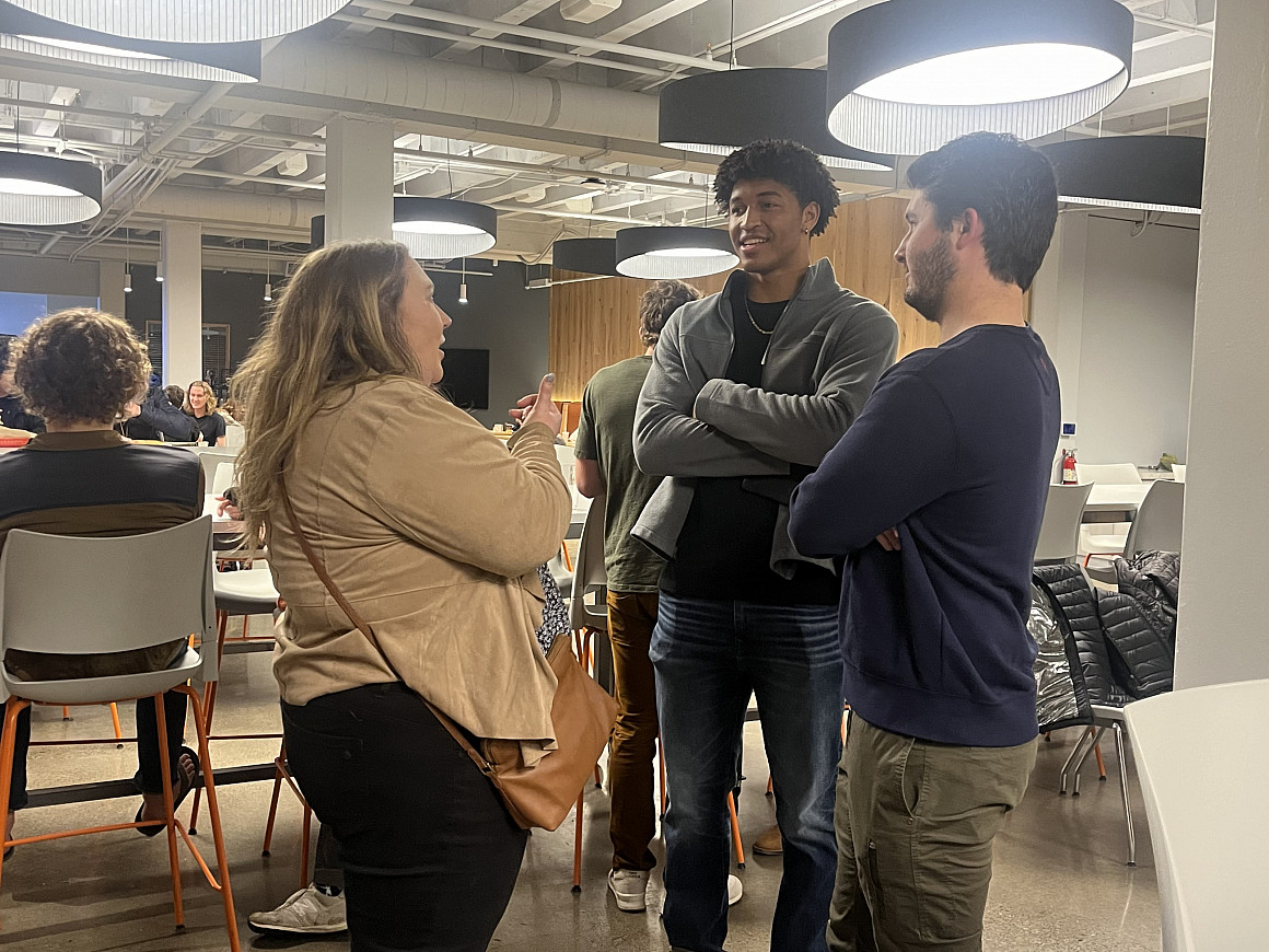 Current students listening to an alum.