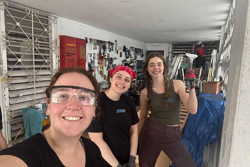 Student volunteers, Brooke and Lily, and Staff Leader, Hannah, support local partner, SBP, with community resilience projects.