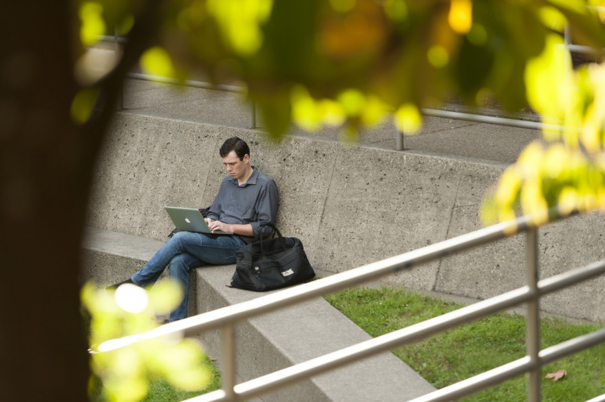 Law student working in the ampitheater