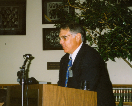 Professor Henry Drummonds speaks at the 1997 Business Law Forum.