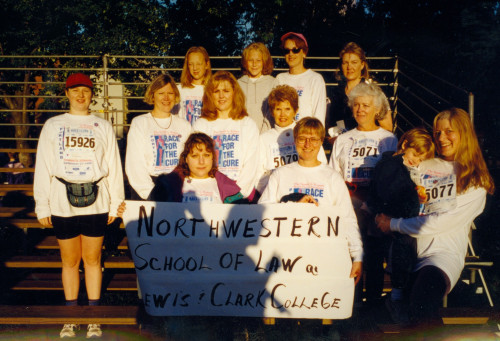 Staff and faculty take part in the Run for the Cure race in 1998.