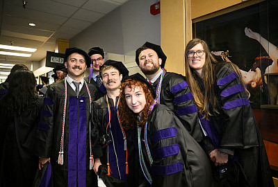 Group of graduates posing together.