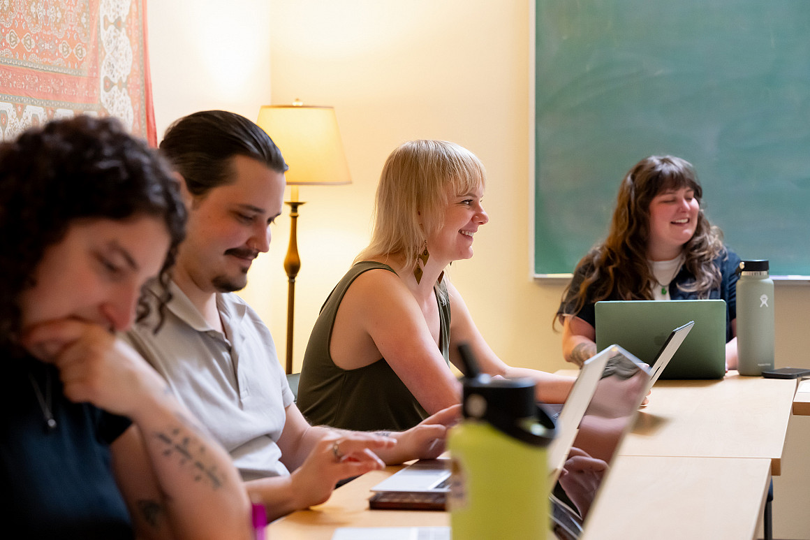 Future family therapists engage in discussions between seeing clients at the Community Counseling Clinic.