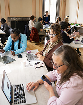 School and district leaders attend one of the principal redesign workshops, sharing real-life problems that were happening in their schoo...