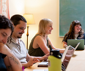 Future family therapists engage in discussions between seeing clients at the Community Counseling Clinic.