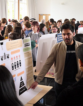 In a packed poster session, participants had the opportunity to discuss student research one-on-one and inspect dioramas of their work.