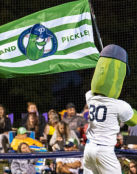 The Portland Pickles mascot, Dillon T. Pickle, provides good vibes throughout the games.