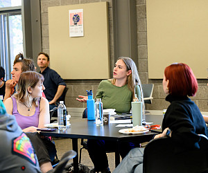 Gwyn Murphy-Cunningham BA '26, a member of the Students Engaged in Eco-Defense Club (SEED), responds to facilitator questions.