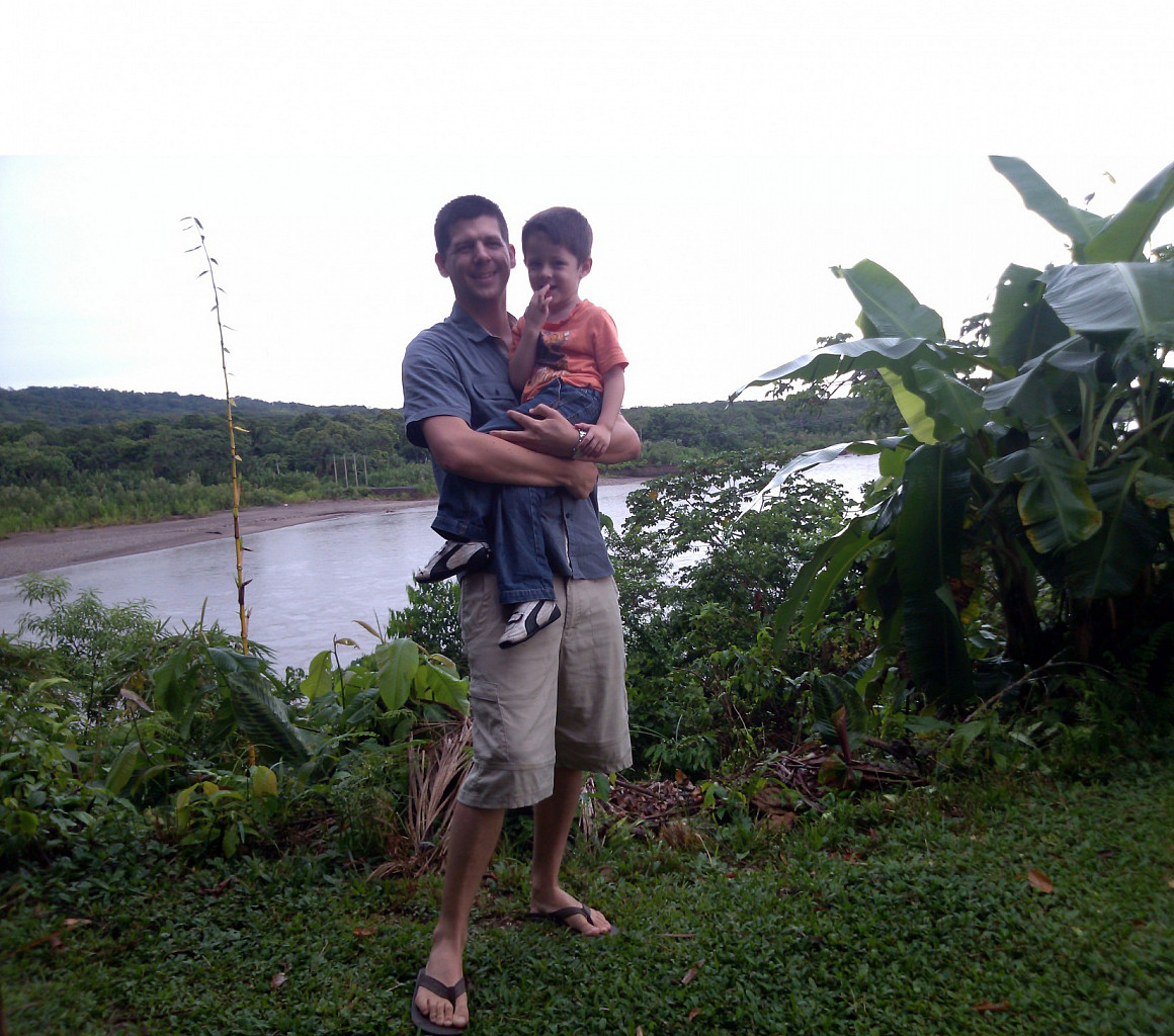 Professor Nick Fromherz and son by the Rio Espiritu Santo in Bolivia