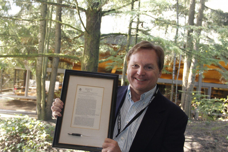 Professor Blumm with the presidential pen used to sign the original Wilderness Act into law; taken at the 2014 Wilderness Act symposium a...