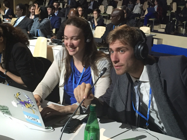 Students Liz Mering and Olivier Jamin at COP plenary session