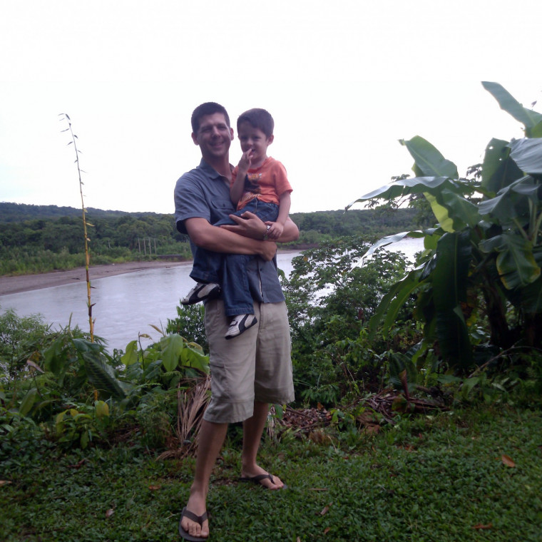 Professor Nick Fromherz and son by the Rio Espiritu Santo in Bolivia