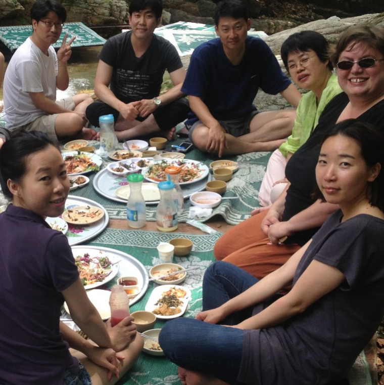 Aubrey Baldwin picnics with Korean law students at Soyang Lake