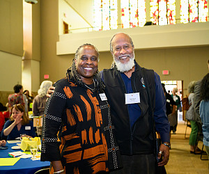 President Robin Holmes-Sullivan with Albina Vision Trust Board Member Michael Alexander.